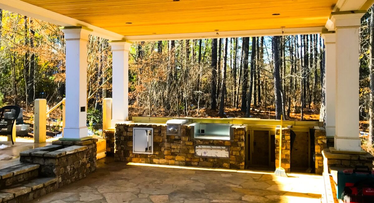 Custom Outdoor Kitchen Design & Fireplace Construction in North Atlanta project photo
